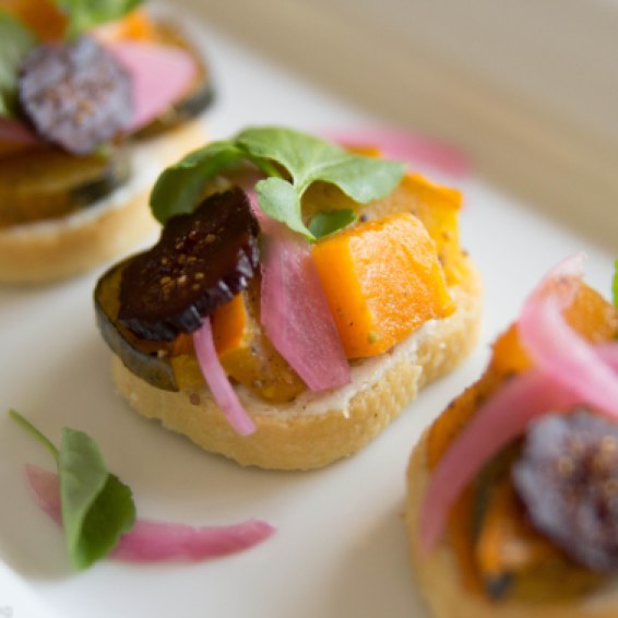 Grilled Crostini with Roasted Seasonal Squash Fall Spiced Local Goat Cheese, Pickled Onion & Candied Fig